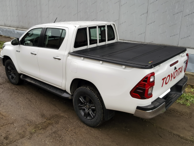 Крышка HAL 4-х секционная Hilux Revo '15, Араб. версия, с вкладышем и защитой стекла