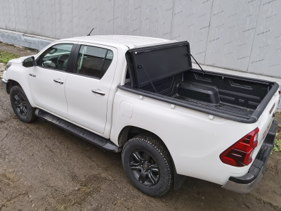 Крышка HAL 4-х секционная Hilux Revo '15, Араб. версия, с вкладышем и защитой стекла